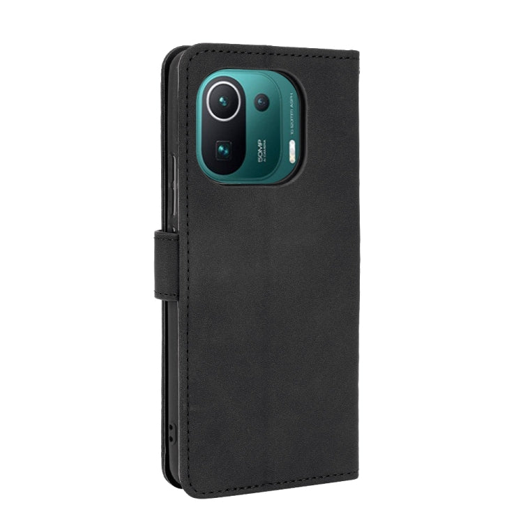 For Xiaomi Mi 11 Pro Solid Color Skin Feel Magnetic Buckle Horizontal Flip Calf Texture PU Leather Case with Holder & Card Slots & Wallet
