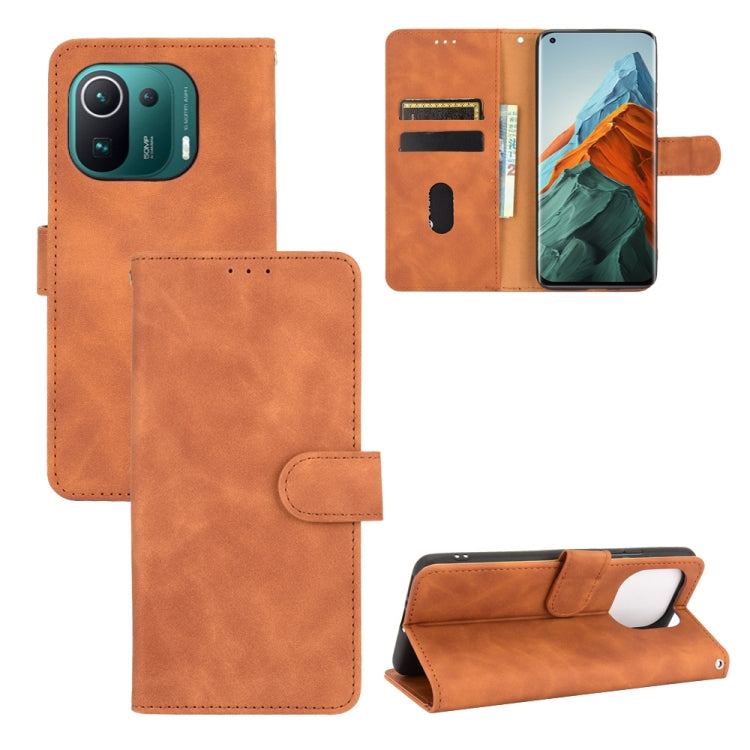 For Xiaomi Mi 11 Pro Solid Color Skin Feel Magnetic Buckle Horizontal Flip Calf Texture PU Leather Case with Holder & Card Slots & Wallet