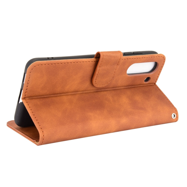 For Samsung Galaxy S21 FE Solid Color Skin Feel Magnetic Buckle Horizontal Flip Calf Texture PU Leather Case with Holder & Card Slots & Wallet