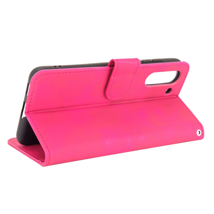 For Samsung Galaxy S21 FE Solid Color Skin Feel Magnetic Buckle Horizontal Flip Calf Texture PU Leather Case with Holder & Card Slots & Wallet