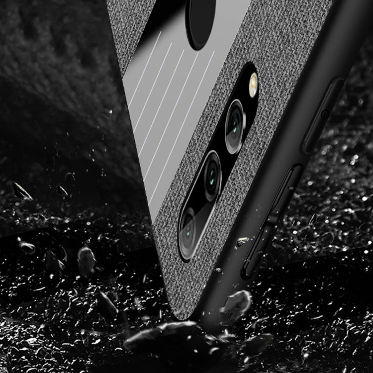 For Huawei Enjoy 9s XINLI Stitching Cloth Textue Shockproof TPU Protective Case with Ring Holder