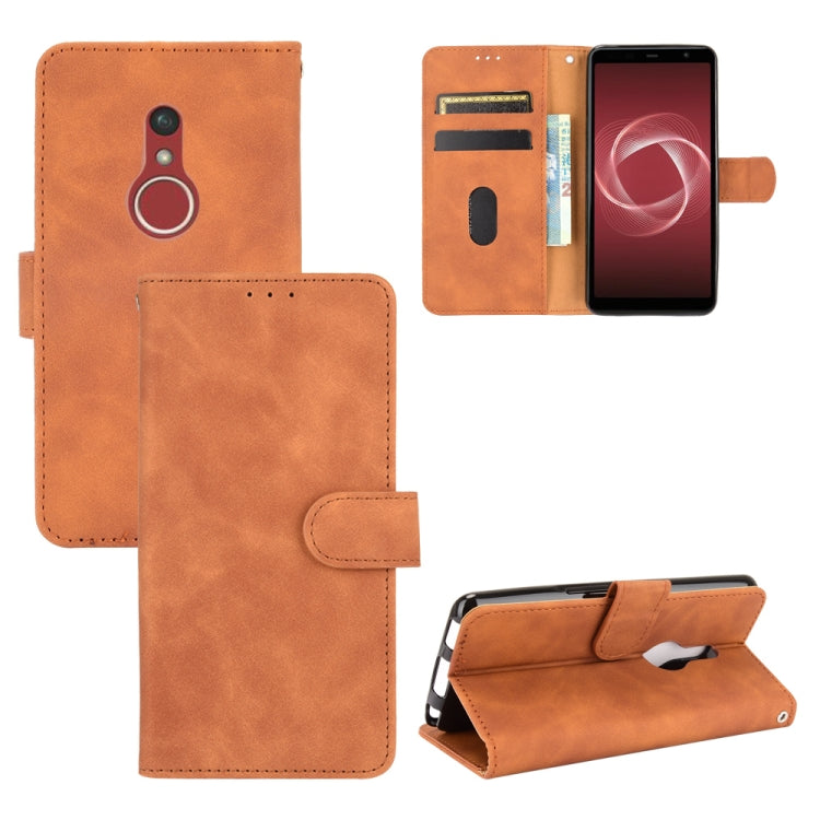 For Fujitsu Be4 Plus F-41B Solid Color Skin Feel Magnetic Buckle Horizontal Flip Calf Texture PU Leather Case with Holder & Card Slots & Wallet