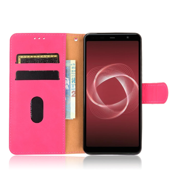 For Fujitsu Be4 Plus F-41B Solid Color Skin Feel Magnetic Buckle Horizontal Flip Calf Texture PU Leather Case with Holder & Card Slots & Wallet