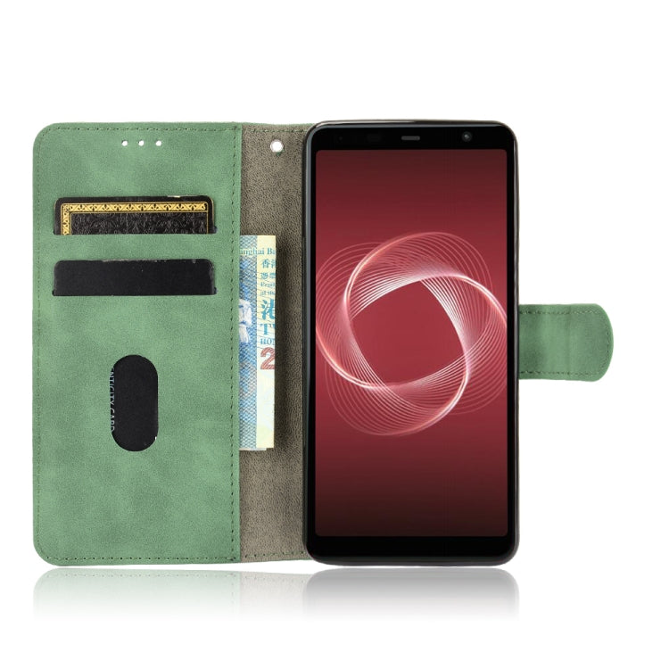 For Fujitsu Be4 Plus F-41B Solid Color Skin Feel Magnetic Buckle Horizontal Flip Calf Texture PU Leather Case with Holder & Card Slots & Wallet