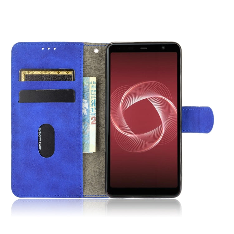 For Fujitsu Be4 Plus F-41B Solid Color Skin Feel Magnetic Buckle Horizontal Flip Calf Texture PU Leather Case with Holder & Card Slots & Wallet