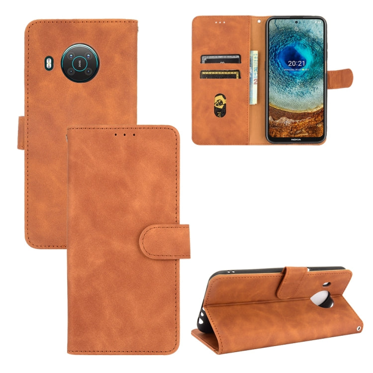 For Nokia X10 Solid Color Skin Feel Magnetic Buckle Horizontal Flip Calf Texture PU Leather Case with Holder & Card Slots & Wallet