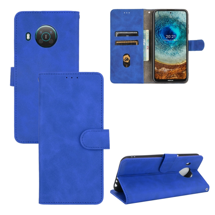 For Nokia X10 Solid Color Skin Feel Magnetic Buckle Horizontal Flip Calf Texture PU Leather Case with Holder & Card Slots & Wallet