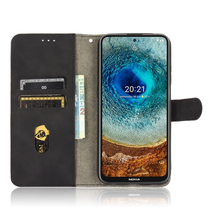 For Nokia X10 Solid Color Skin Feel Magnetic Buckle Horizontal Flip Calf Texture PU Leather Case with Holder & Card Slots & Wallet