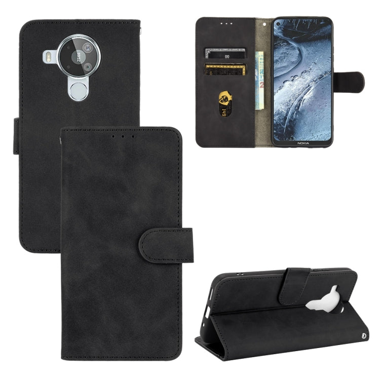 For Nokia 7.3 Solid Color Skin Feel Magnetic Buckle Horizontal Flip Calf Texture PU Leather Case with Holder & Card Slots & Wallet