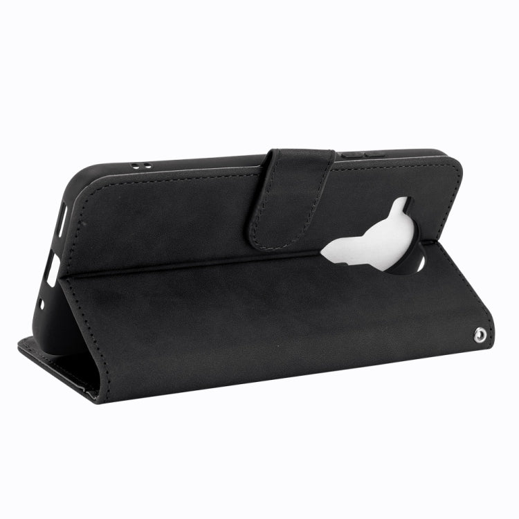 For Nokia 7.3 Solid Color Skin Feel Magnetic Buckle Horizontal Flip Calf Texture PU Leather Case with Holder & Card Slots & Wallet