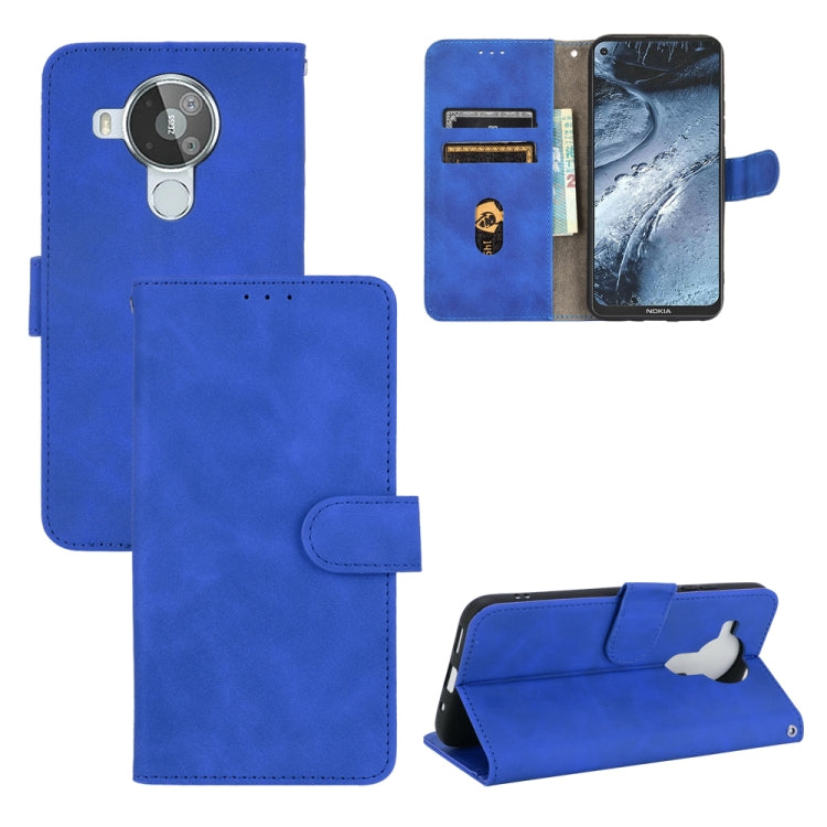 For Nokia 7.3 Solid Color Skin Feel Magnetic Buckle Horizontal Flip Calf Texture PU Leather Case with Holder & Card Slots & Wallet