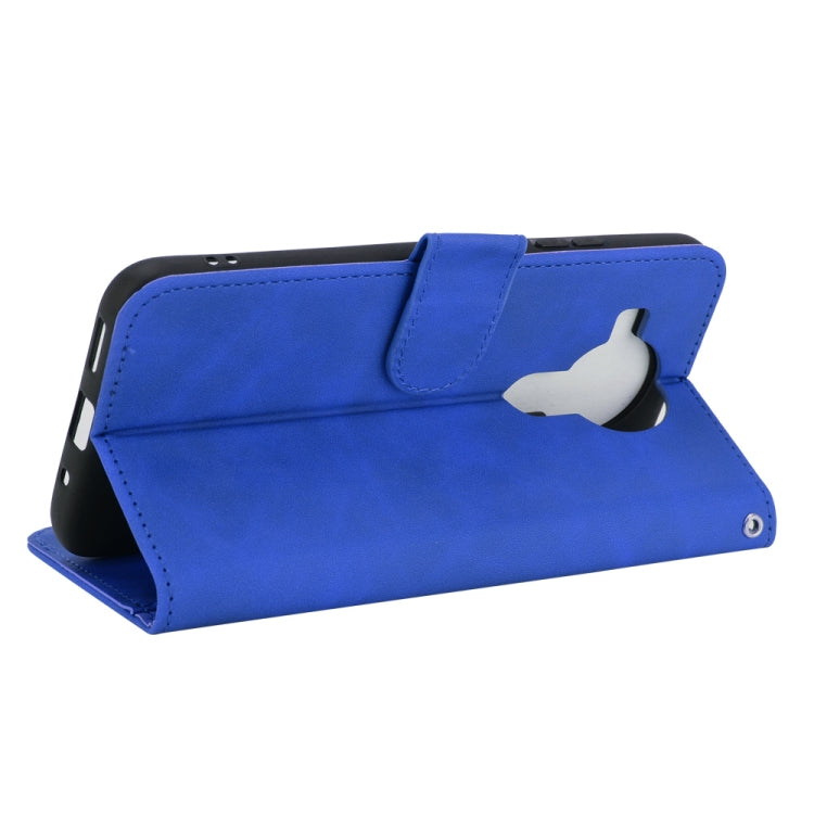 For Nokia 7.3 Solid Color Skin Feel Magnetic Buckle Horizontal Flip Calf Texture PU Leather Case with Holder & Card Slots & Wallet