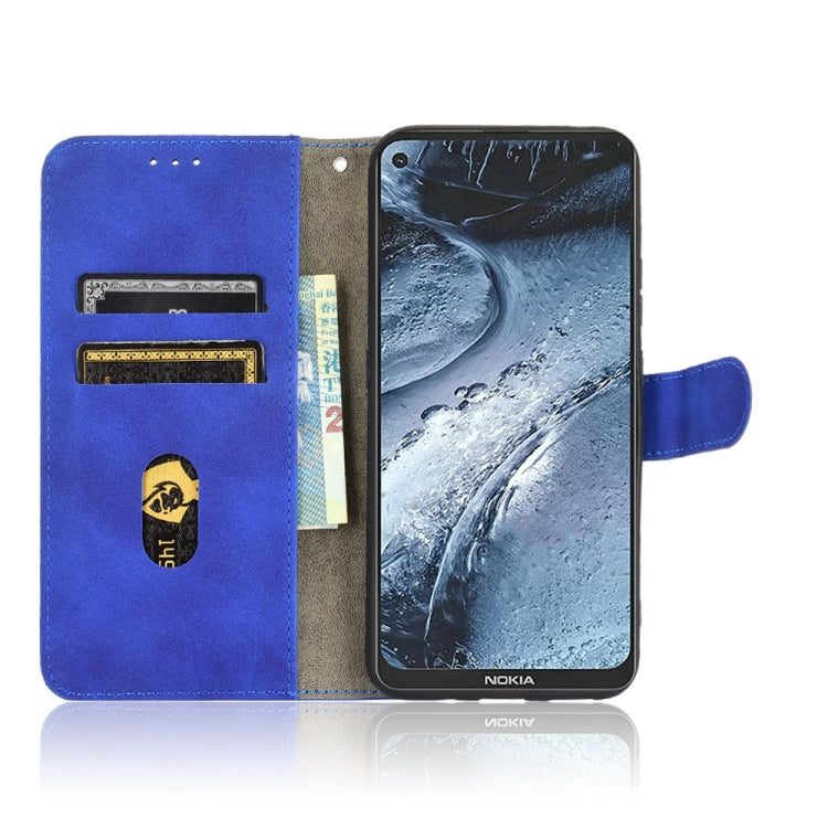 For Nokia 7.3 Solid Color Skin Feel Magnetic Buckle Horizontal Flip Calf Texture PU Leather Case with Holder & Card Slots & Wallet