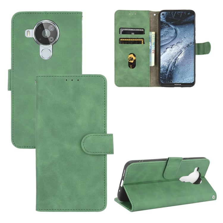 For Nokia 7.3 Solid Color Skin Feel Magnetic Buckle Horizontal Flip Calf Texture PU Leather Case with Holder & Card Slots & Wallet
