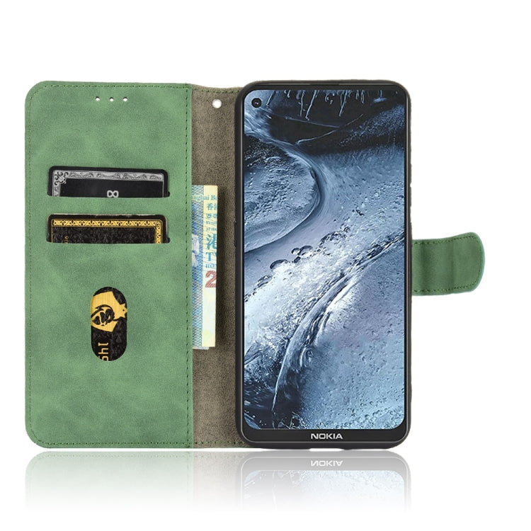 For Nokia 7.3 Solid Color Skin Feel Magnetic Buckle Horizontal Flip Calf Texture PU Leather Case with Holder & Card Slots & Wallet