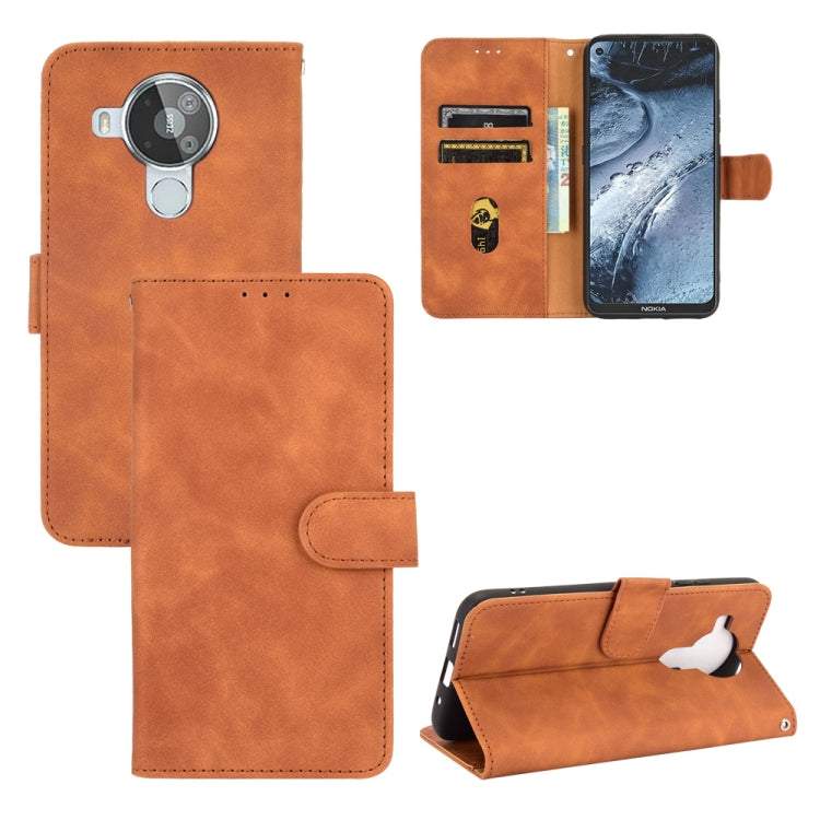 For Nokia 7.3 Solid Color Skin Feel Magnetic Buckle Horizontal Flip Calf Texture PU Leather Case with Holder & Card Slots & Wallet