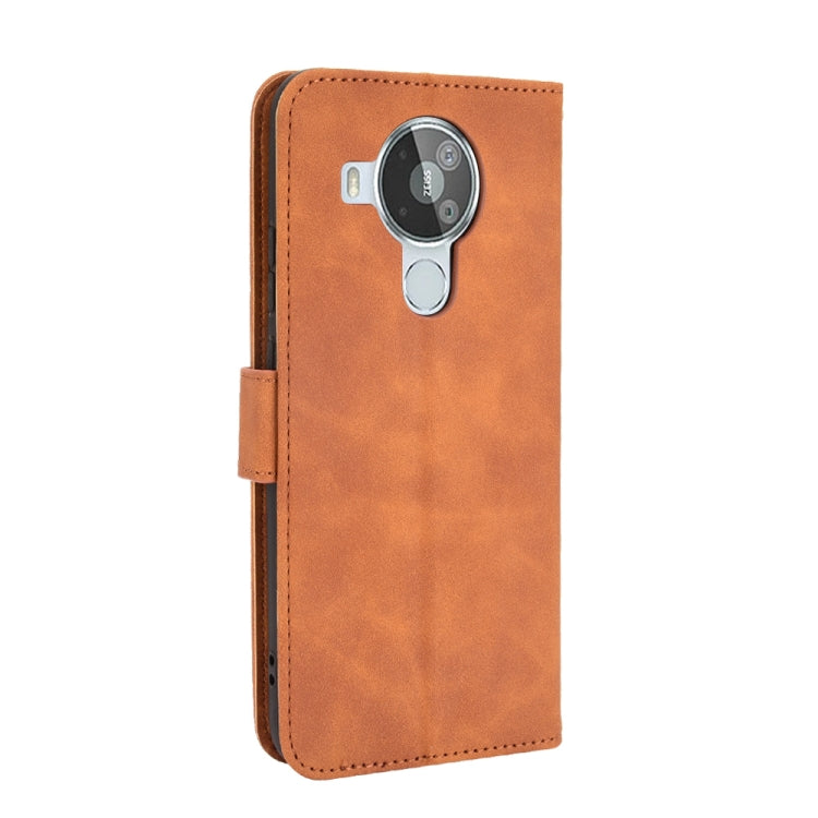 For Nokia 7.3 Solid Color Skin Feel Magnetic Buckle Horizontal Flip Calf Texture PU Leather Case with Holder & Card Slots & Wallet