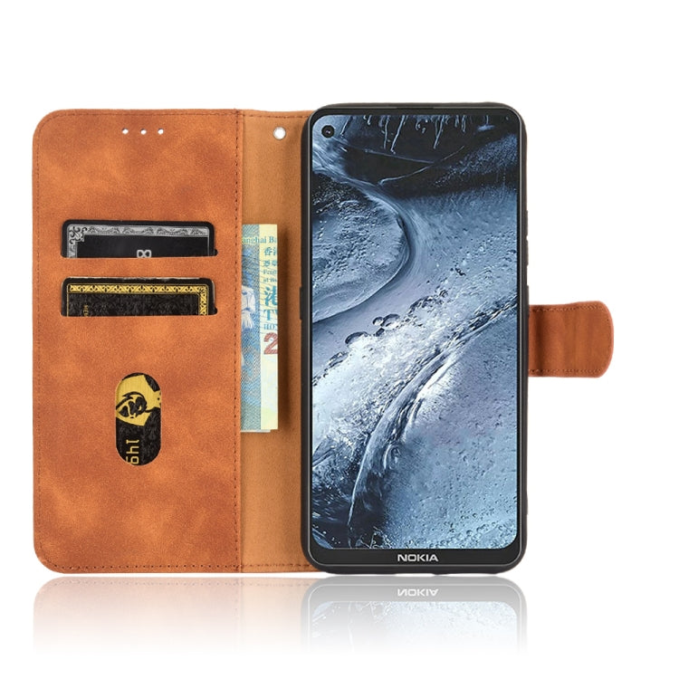 For Nokia 7.3 Solid Color Skin Feel Magnetic Buckle Horizontal Flip Calf Texture PU Leather Case with Holder & Card Slots & Wallet