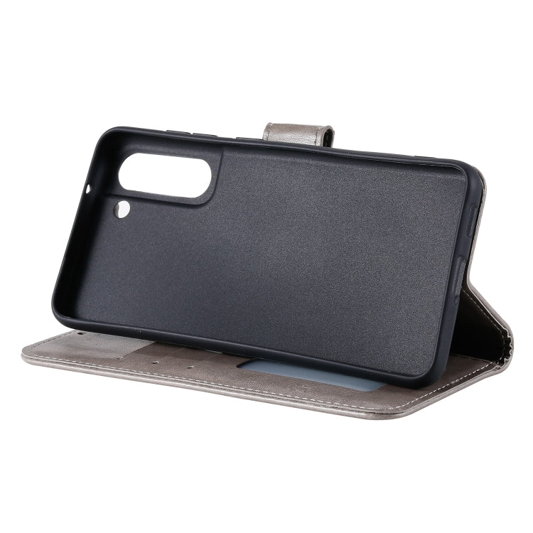 For Samsung Galaxy S21 FE Totem Flower Embossed Horizontal Flip TPU + PU Leather Case with Holder & Card Slots & Wallet