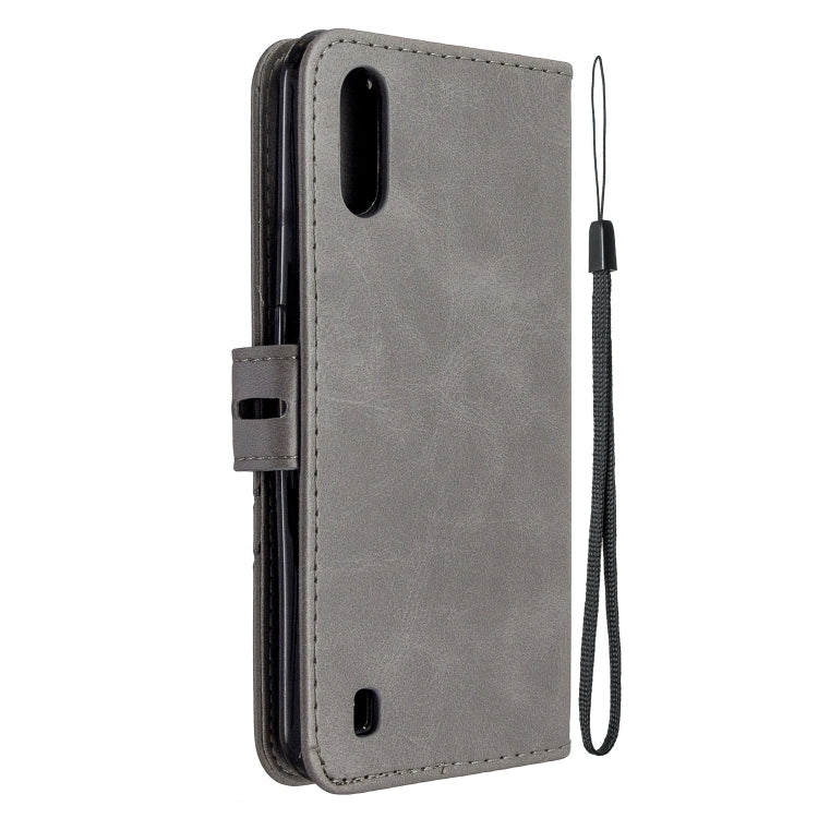 For Samsung Galaxy A01 Stitching Style 2-Color Cow Texture Horizontal Flip PU Leather Case with Holder & Card Slot & Lanyard