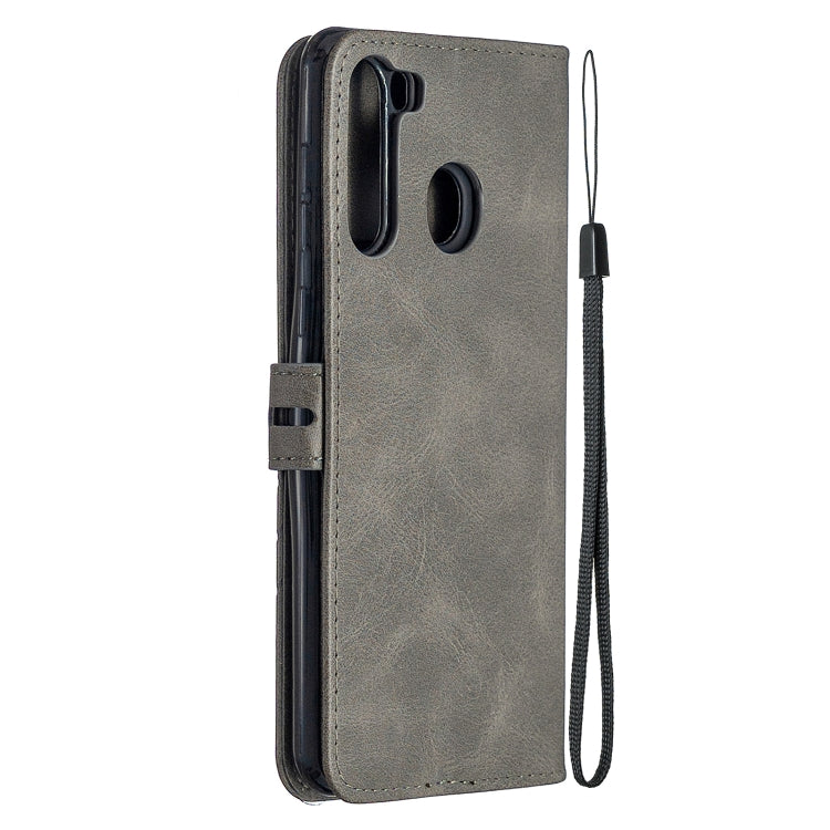 For Samsung Galaxy A21 US Version Stitching Style 2-Color Cow Texture Horizontal Flip PU Leather Case with Holder & Card Slot & Lanyard