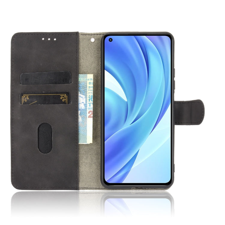 For Xiaomi Mi 11 Lite Solid Color Skin Feel Magnetic Buckle Horizontal Flip Calf Texture PU Leather Case with Holder & Card Slots & Wallet