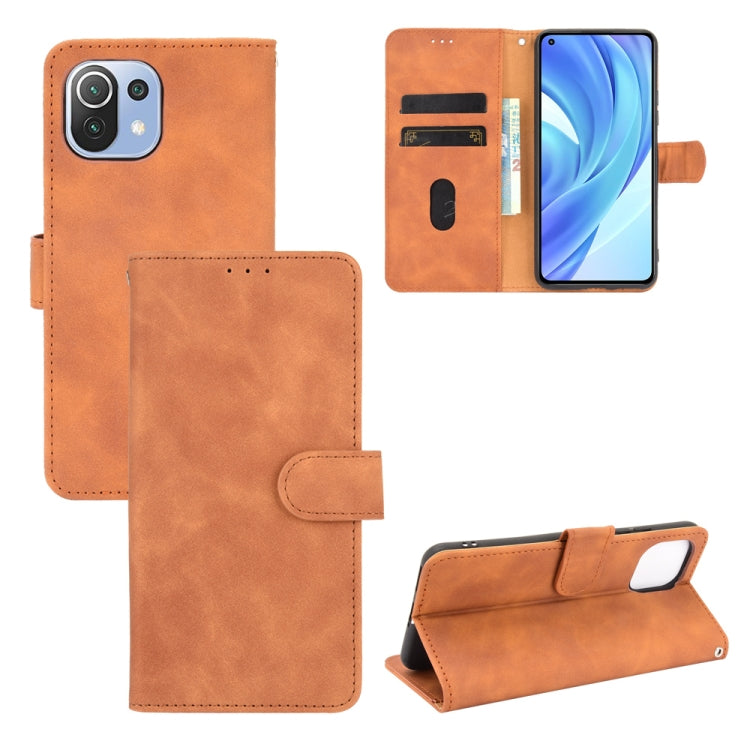 For Xiaomi Mi 11 Lite Solid Color Skin Feel Magnetic Buckle Horizontal Flip Calf Texture PU Leather Case with Holder & Card Slots & Wallet