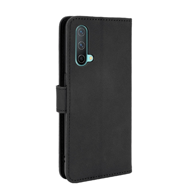 For OnePlus Nord CE 5G Solid Color Skin Feel Magnetic Buckle Horizontal Flip Calf Texture PU Leather Case with Holder & Card Slots & Wallet