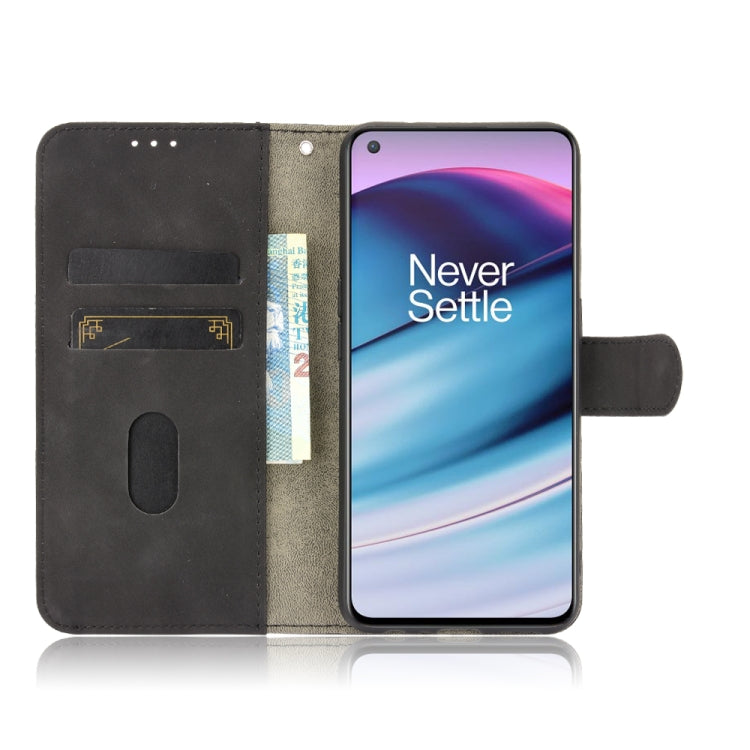 For OnePlus Nord CE 5G Solid Color Skin Feel Magnetic Buckle Horizontal Flip Calf Texture PU Leather Case with Holder & Card Slots & Wallet