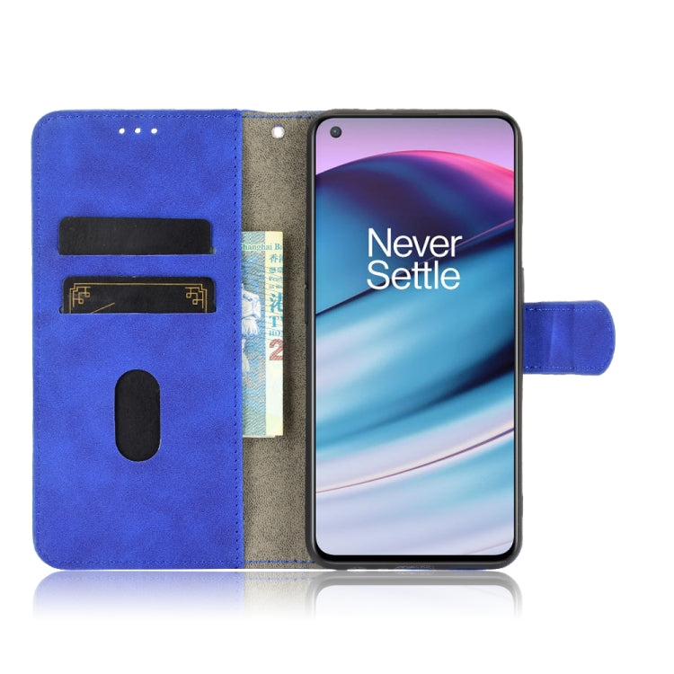 For OnePlus Nord CE 5G Solid Color Skin Feel Magnetic Buckle Horizontal Flip Calf Texture PU Leather Case with Holder & Card Slots & Wallet