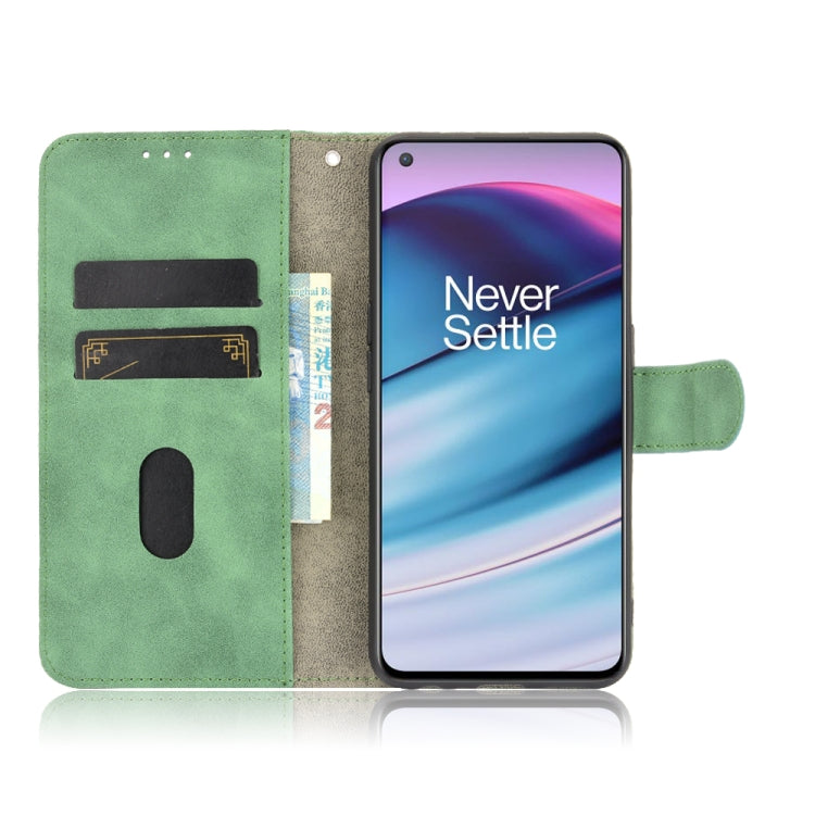 For OnePlus Nord CE 5G Solid Color Skin Feel Magnetic Buckle Horizontal Flip Calf Texture PU Leather Case with Holder & Card Slots & Wallet