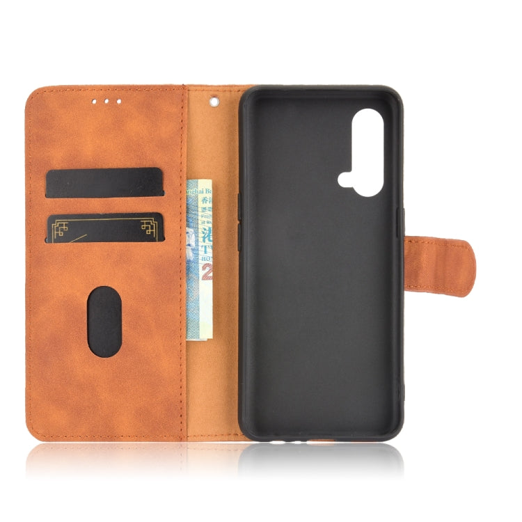 For OnePlus Nord CE 5G Solid Color Skin Feel Magnetic Buckle Horizontal Flip Calf Texture PU Leather Case with Holder & Card Slots & Wallet