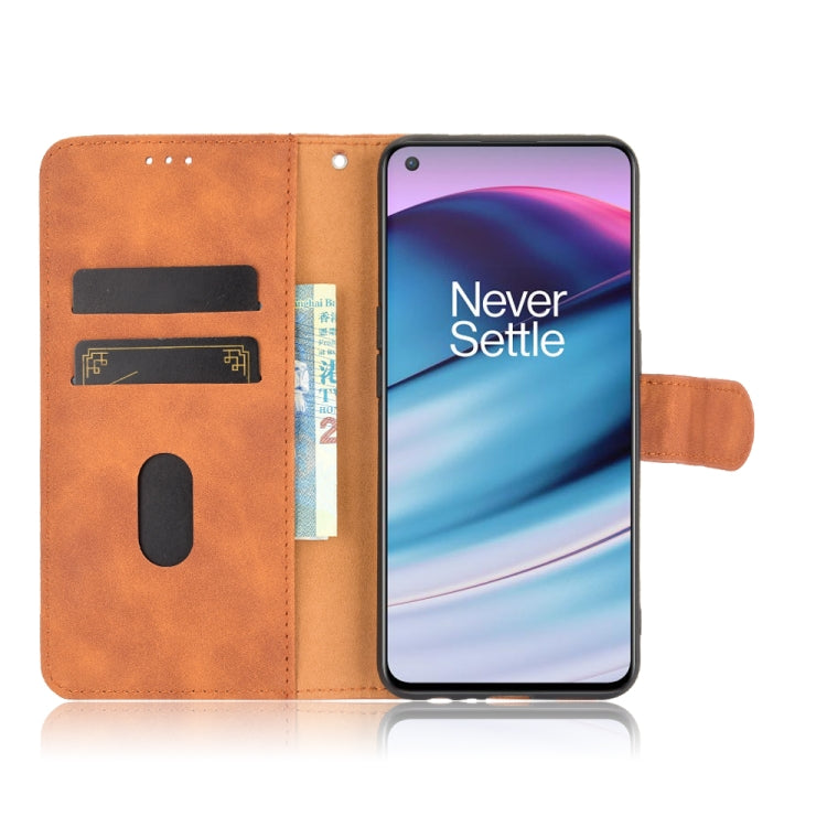 For OnePlus Nord CE 5G Solid Color Skin Feel Magnetic Buckle Horizontal Flip Calf Texture PU Leather Case with Holder & Card Slots & Wallet