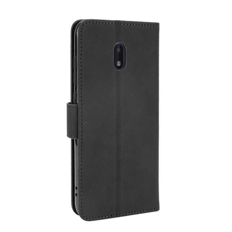 For Nokia C1 Plus Solid Color Skin Feel Magnetic Buckle Horizontal Flip Calf Texture PU Leather Case with Holder & Card Slots & Wallet