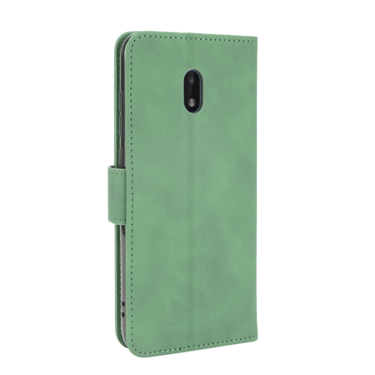 For Nokia C1 Plus Solid Color Skin Feel Magnetic Buckle Horizontal Flip Calf Texture PU Leather Case with Holder & Card Slots & Wallet