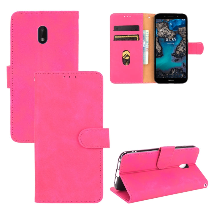 For Nokia C1 Plus Solid Color Skin Feel Magnetic Buckle Horizontal Flip Calf Texture PU Leather Case with Holder & Card Slots & Wallet