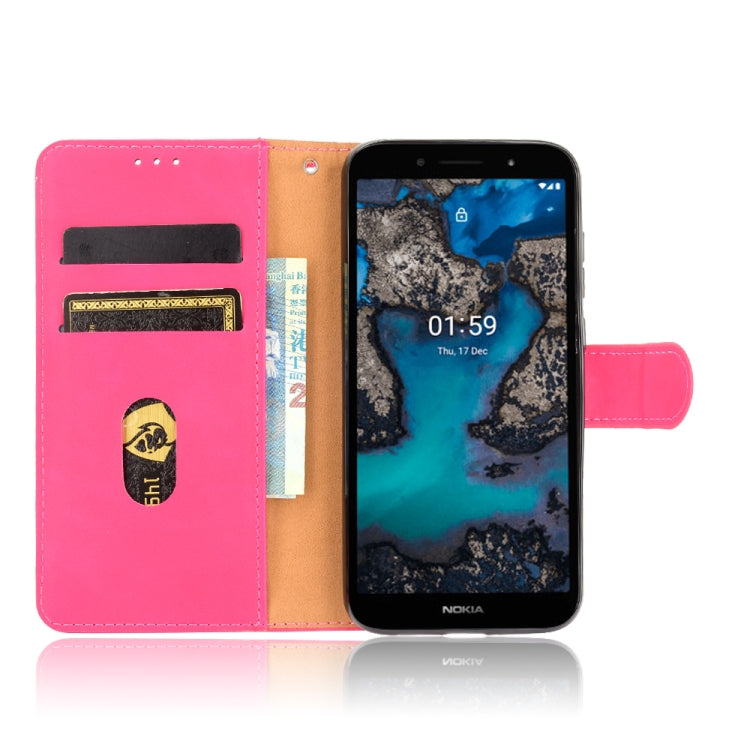 For Nokia C1 Plus Solid Color Skin Feel Magnetic Buckle Horizontal Flip Calf Texture PU Leather Case with Holder & Card Slots & Wallet