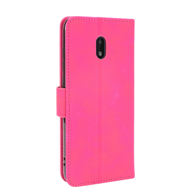 For Nokia C1 Plus Solid Color Skin Feel Magnetic Buckle Horizontal Flip Calf Texture PU Leather Case with Holder & Card Slots & Wallet