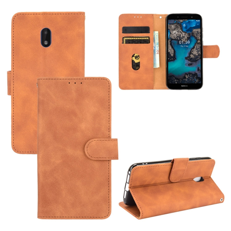 For Nokia C1 Plus Solid Color Skin Feel Magnetic Buckle Horizontal Flip Calf Texture PU Leather Case with Holder & Card Slots & Wallet