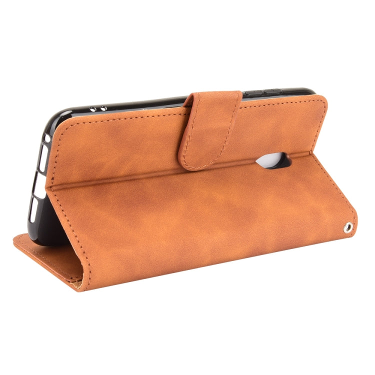 For Nokia C1 Plus Solid Color Skin Feel Magnetic Buckle Horizontal Flip Calf Texture PU Leather Case with Holder & Card Slots & Wallet