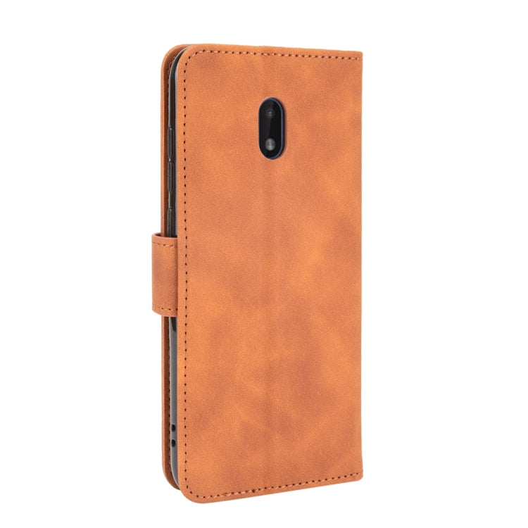 For Nokia C1 Plus Solid Color Skin Feel Magnetic Buckle Horizontal Flip Calf Texture PU Leather Case with Holder & Card Slots & Wallet