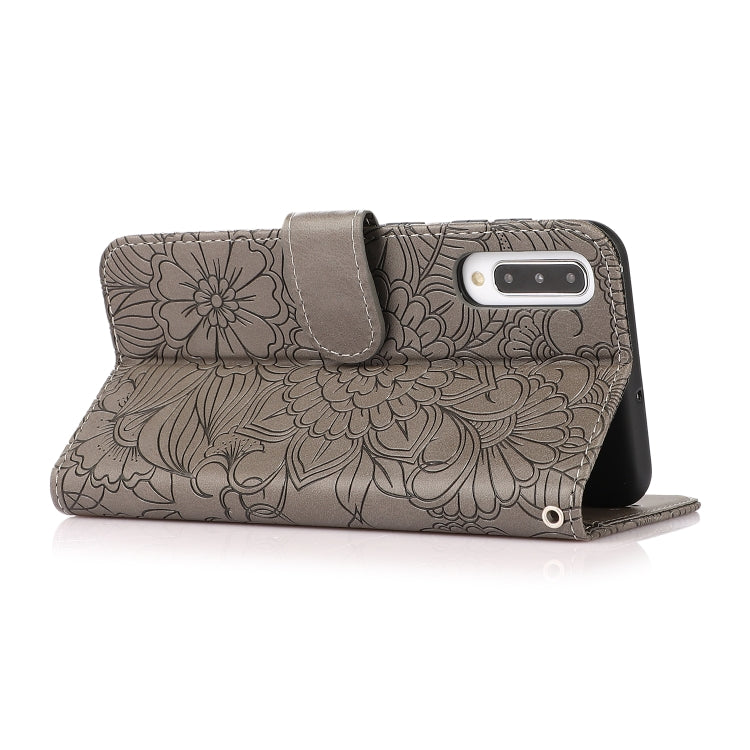 For Samsung Galaxy A50s Skin Feel Embossed Sunflower Horizontal Flip Leather Case with Holder & Card Slots & Wallet & Lanyard