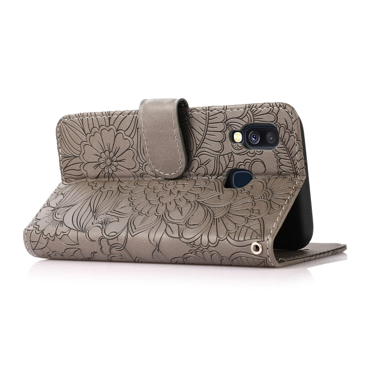 For Samsung Galaxy A40 Skin Feel Embossed Sunflower Horizontal Flip Leather Case with Holder & Card Slots & Wallet & Lanyard
