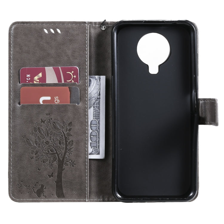 For Nokia G20 Tree & Cat Pattern Pressed Printing Horizontal Flip PU Leather Case with Holder & Card Slots & Wallet & Lanyard