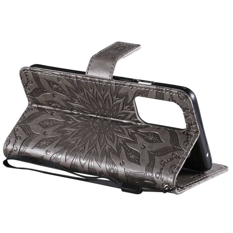 For OnePlus 9 Sun Embossing Pattern Horizontal Flip Leather Case with Card Slot & Holder & Wallet & Lanyard