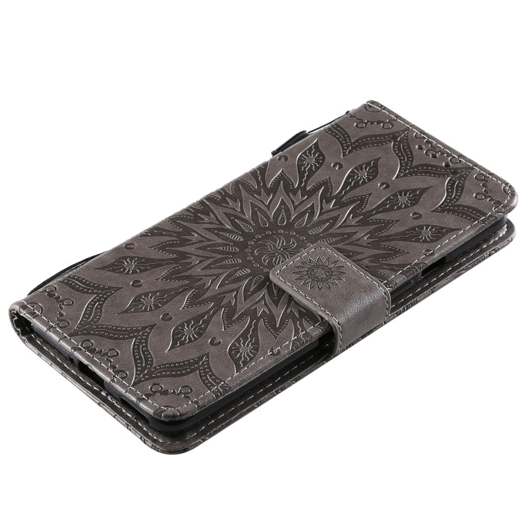 For OnePlus 9 Sun Embossing Pattern Horizontal Flip Leather Case with Card Slot & Holder & Wallet & Lanyard