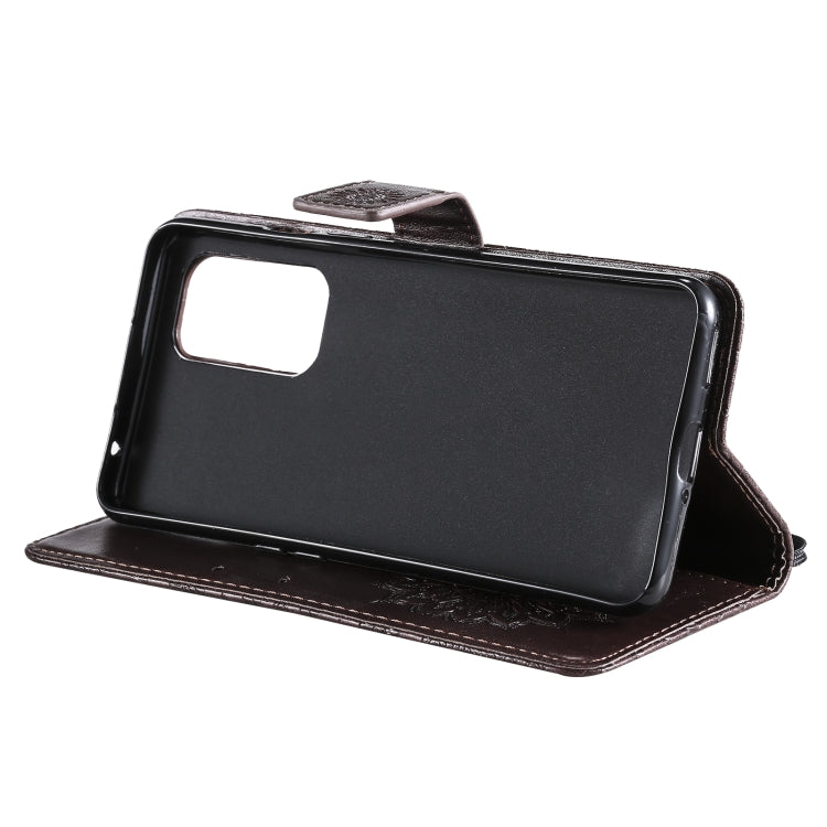 For OnePlus 9 Sun Embossing Pattern Horizontal Flip Leather Case with Card Slot & Holder & Wallet & Lanyard