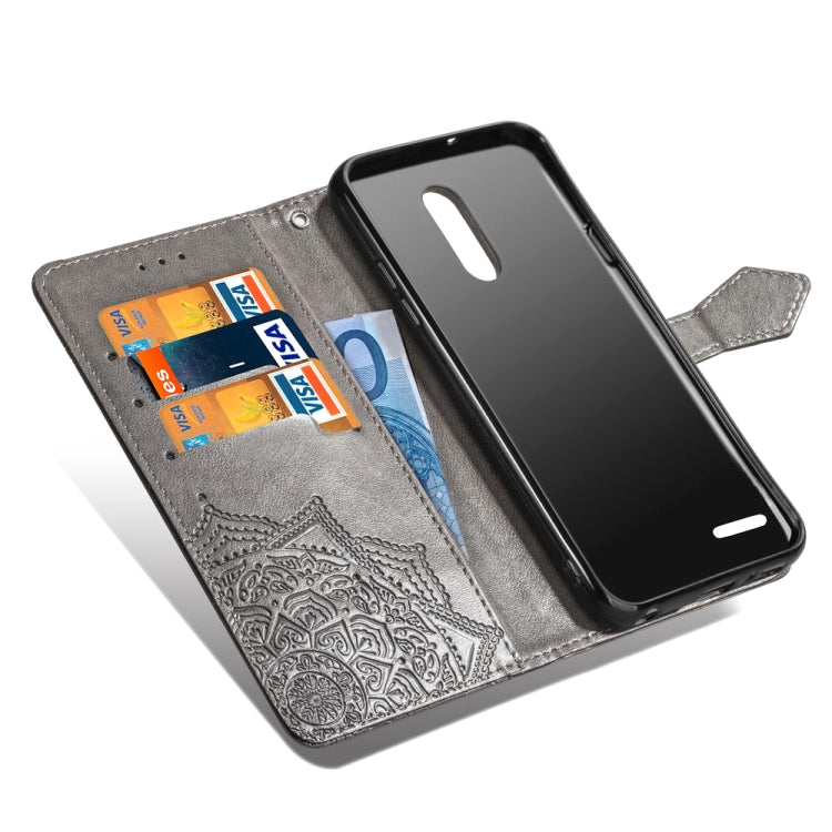 For LG K10 (2018) Halfway Mandala Embossing Pattern Horizontal Flip Leather Case with Holder & Card Slots & Wallet & Lanyard