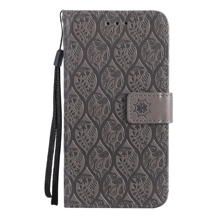 For iPhone 13 Pressed Printing Rattan Flower Pattern Horizontal Flip PU Leather Case with Holder & Card Slots & Wallet & Photo Frame