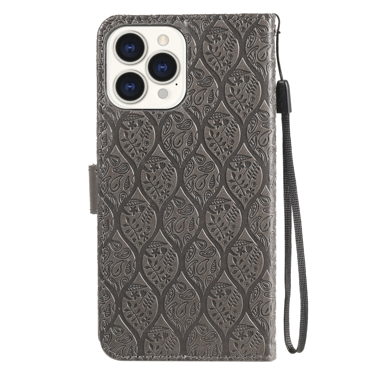 For iPhone 13 Pro Pressed Printing Rattan Flower Pattern Horizontal Flip PU Leather Case with Holder & Card Slots & Wallet & Photo Frame